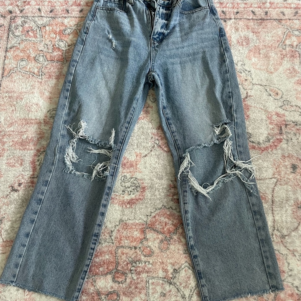 Distressed Blue Jeans